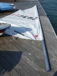 13 - Slide the sail onto the mast