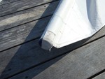 14 - Inspect the sail, make sure it is all the way on the mast, and straight