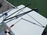 10 - Make sure the tiller is threaded through the traveler correctly, tighten traveler